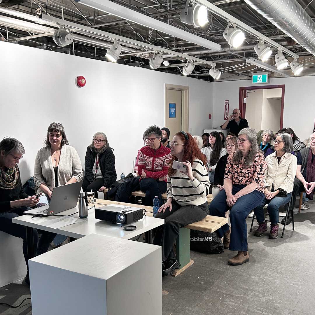 Audience watching a Praxis talk